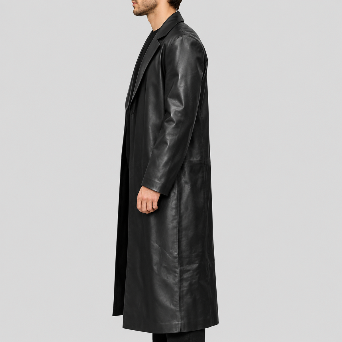 Men's black extra-long open-front leather duster coat left side view